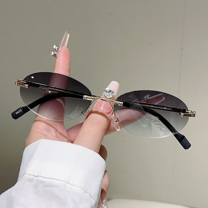نظارات شمسية بيضاوية بدون إطار - مراجعة Designer Sunglasses وسعره