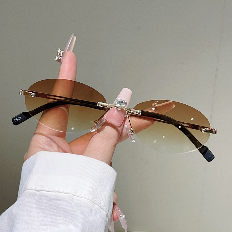 نظارات شمسية بيضاوية بدون إطار - مراجعة Designer Sunglasses وسعره