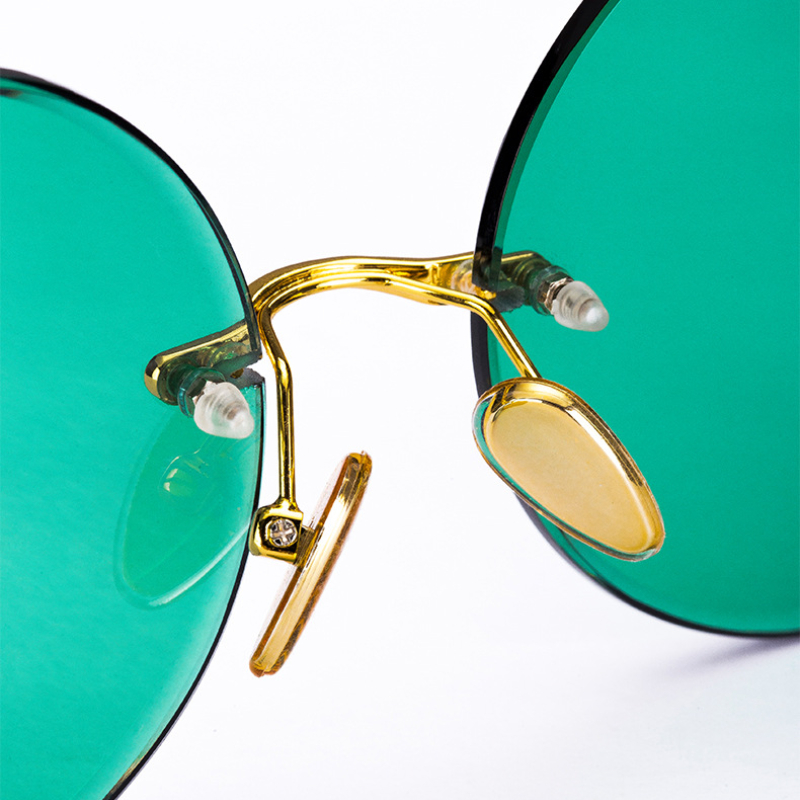 نظارات شمسية كلاسيكية بدون إطا - مراجعة Designer Sunglasses وسعره